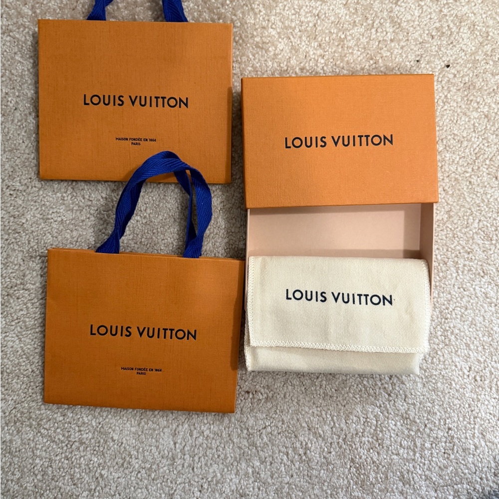 Louis Vuitton Vibrant Orange Box with Bold Blue Handles